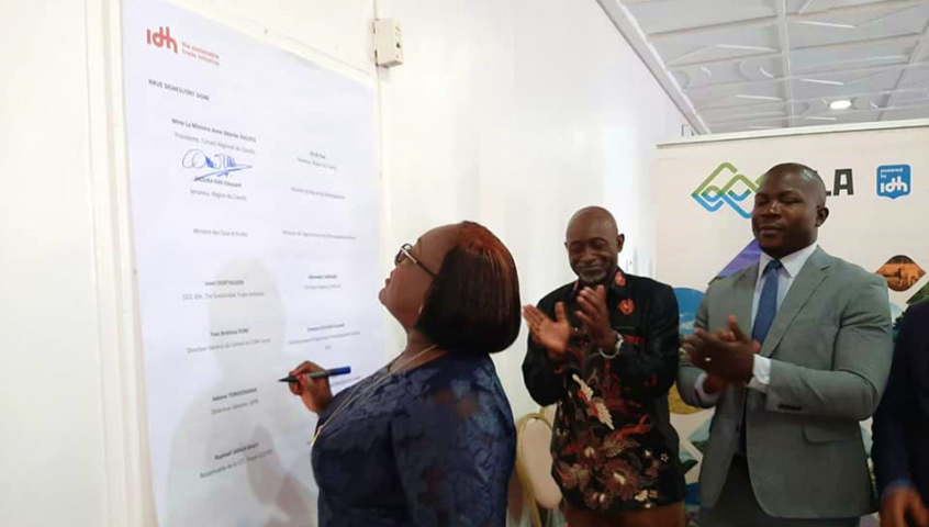 Minister Anne Ouloto signing Letter of Intent 20 Feb 2020 in Cote dIvoire
